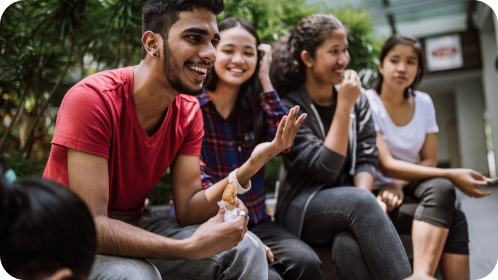 Four students sitting together. 