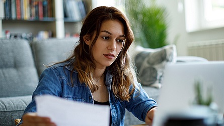 Woman working on a computer.