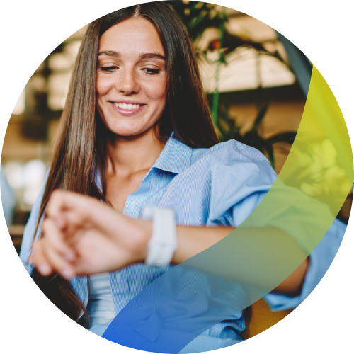 Young woman checking her smart watch